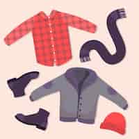 Бесплатное векторное изображение Рисованная зимняя одежда и предметы первой необходимости
