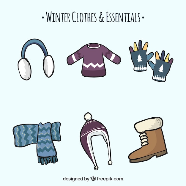 Free vector hand drawn winter clothes & essentials