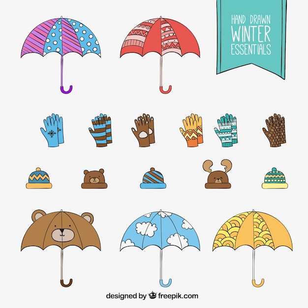 Free vector hand drawn winter clothes