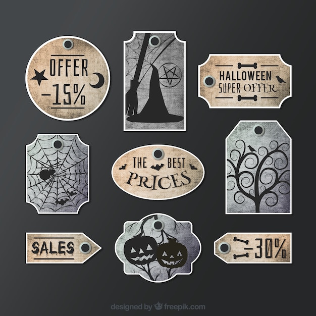 Free vector hand painted halloween labels