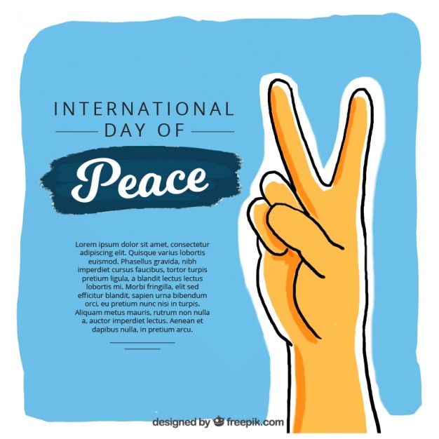 Hand with peace symbol on blue background