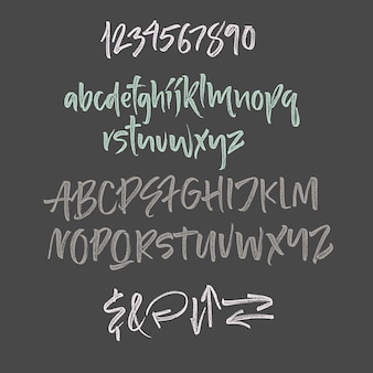 Handwritten script font. brush font. uppercase, numbers, punctuation