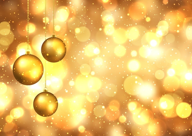 Free vector hanging christmas baubles on a golden bokeh lights background