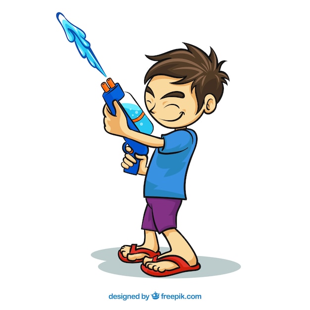 Счастливый мальчик, играющий с водяным пистолетом