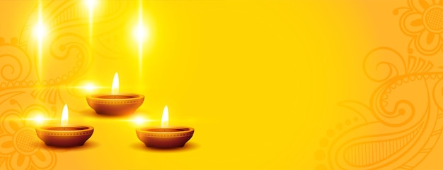 Free Vector | Happy diwali banner with glowing diya and text space in  yellow background