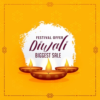 Happy diwali greeting design template with three diya lamps on yellow background