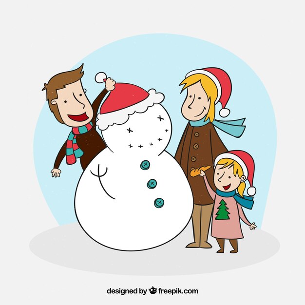 雪だるまを作る幸せな家族