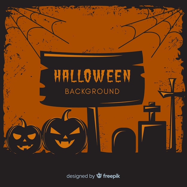 Free vector happy halloween background with evil pumpkins and cemetery