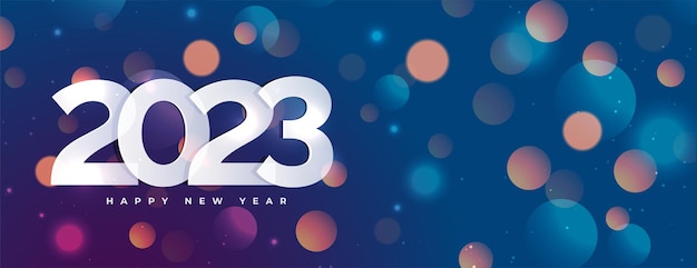 Vettore gratuito felice anno nuovo 2023 occasione banner in stile bokeh