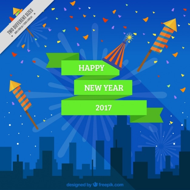 Vettore gratuito felice anno nuovo sfondo con fuochi d'artificio e la silhouette della città