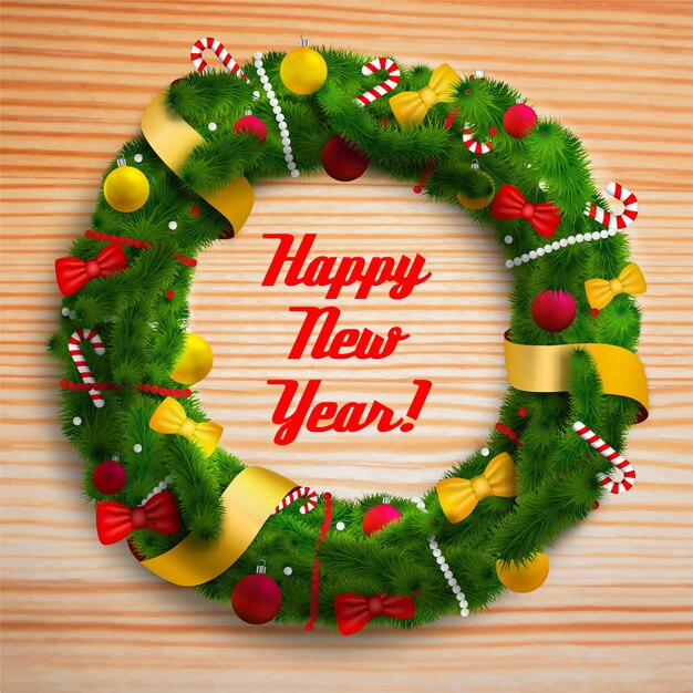 Happy new year decorated wreath on wooden table
