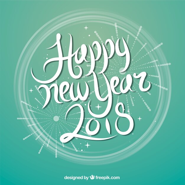 Happy new year in white lettering on a turquoise background