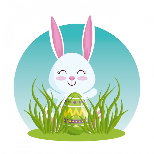 Free vector happy rabbit with easter egg in the grass