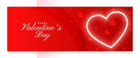 Бесплатное векторное изображение Счастливый день святого валентина приветственный баннер с светящимся сердцем любви