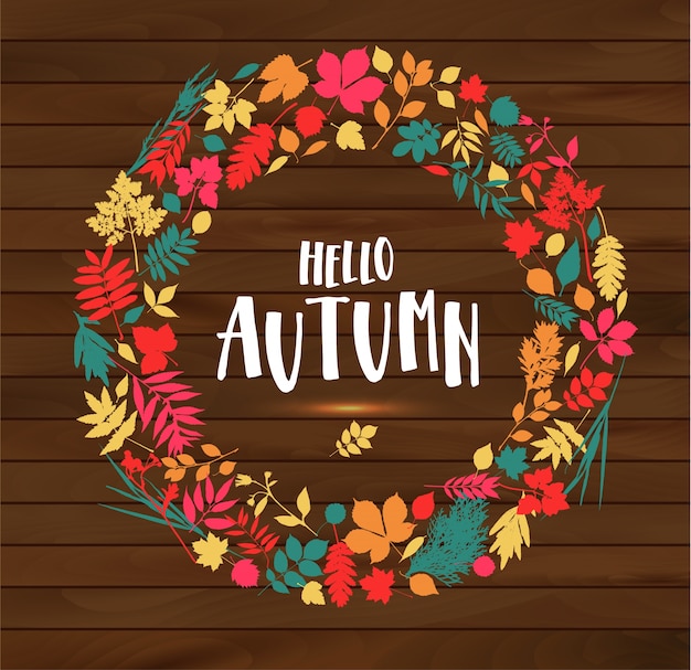 Free vector hello autumn illustration on wooden background