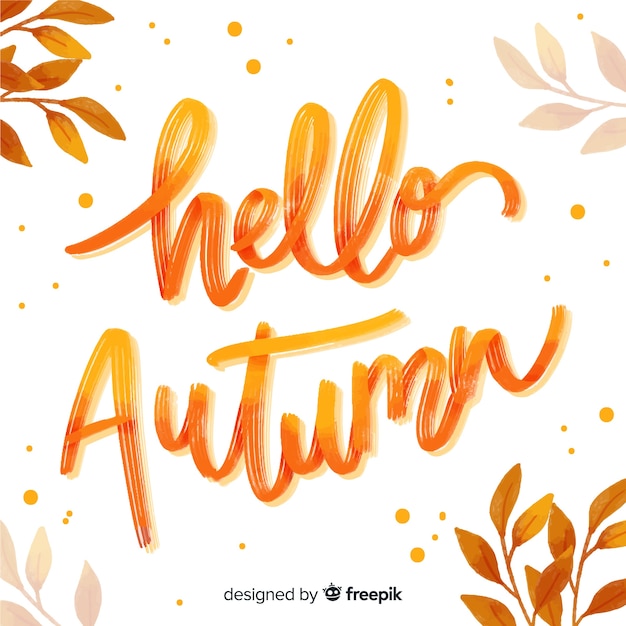 Free vector hello autumn lettering with leaves