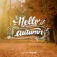 Free vector hello autumn lettering with photo