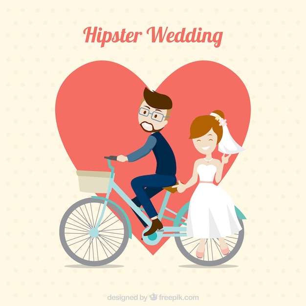 自転車でのヒップスターの結婚式のカップル