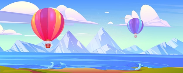 hot air balloons flying above ocean and mountains