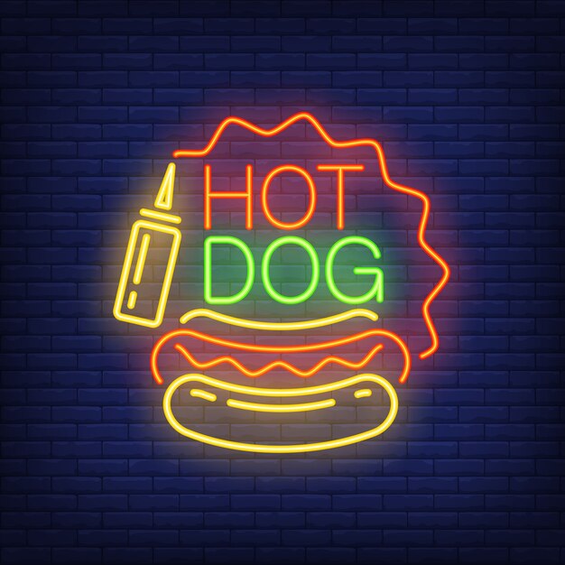 Hot dog neon sign. Sausage loaf, mustard and star shaped frame on brick wall background.