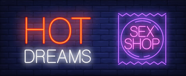 Free vector hot dreams sex shop neon sign. purple condom package against brick wall.