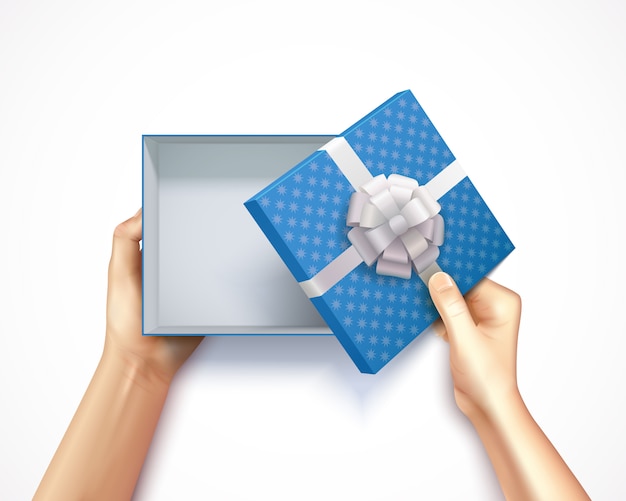 Human hands holding gift box top view realistic 3D square carton with blue polka dot 