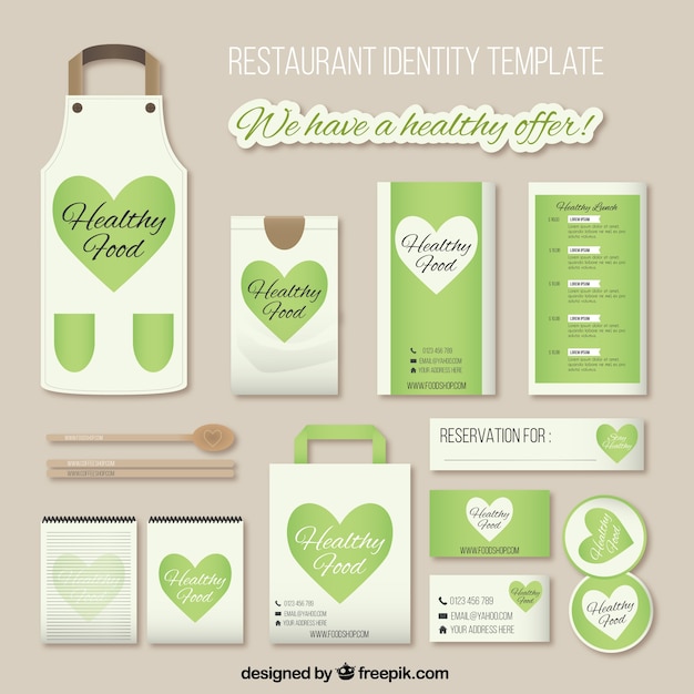 Vettore gratuito corporate identity per il ristorante con il cuore verde