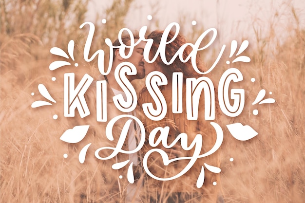 Vettore gratuito lettering del giorno del bacio internazionale