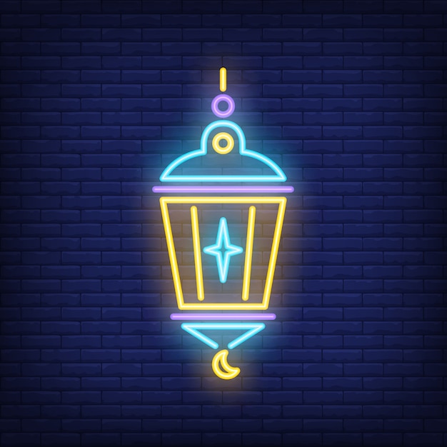 Islamic lantern neon sign. lamp with star and crescent on dark brick wall background