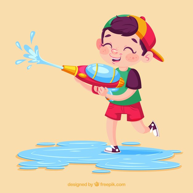 Kid playing with colorful water gun