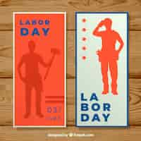 Free vector labor day banners with worker silhouette