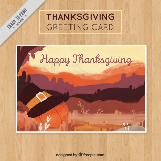 Landscape card with thanksgiving pumpkin and hat