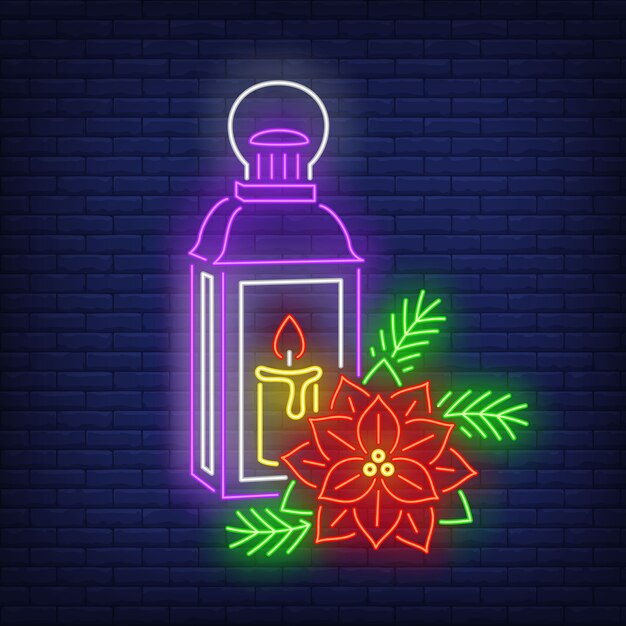 La lanterna con la candela e la stella di natale fioriscono l'insegna al neon