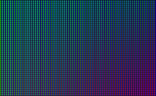 Free Vector led wall video screen with green, blue and red dot lights on black background.