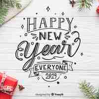 Free vector lettering new year 2019