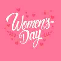 Free vector lettering women's day with hearts