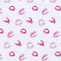 Free vector lipstick stains pattern background
