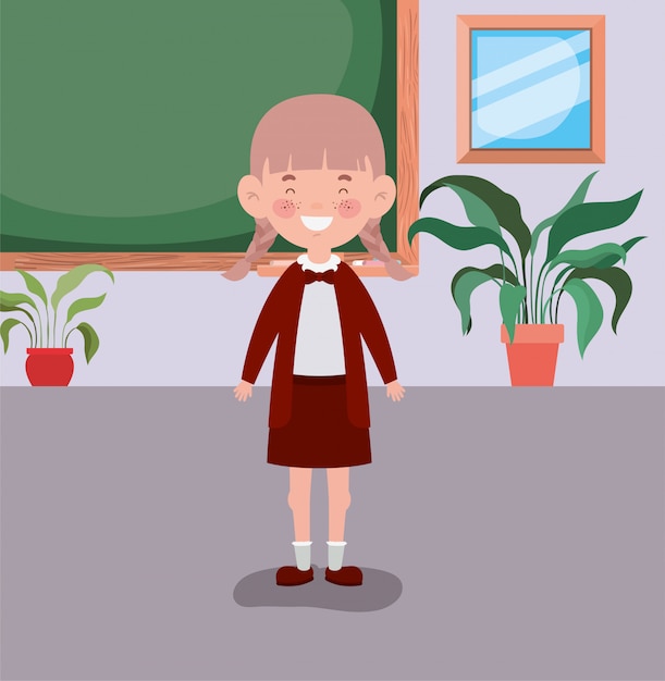 教室で小さな学生の女の子