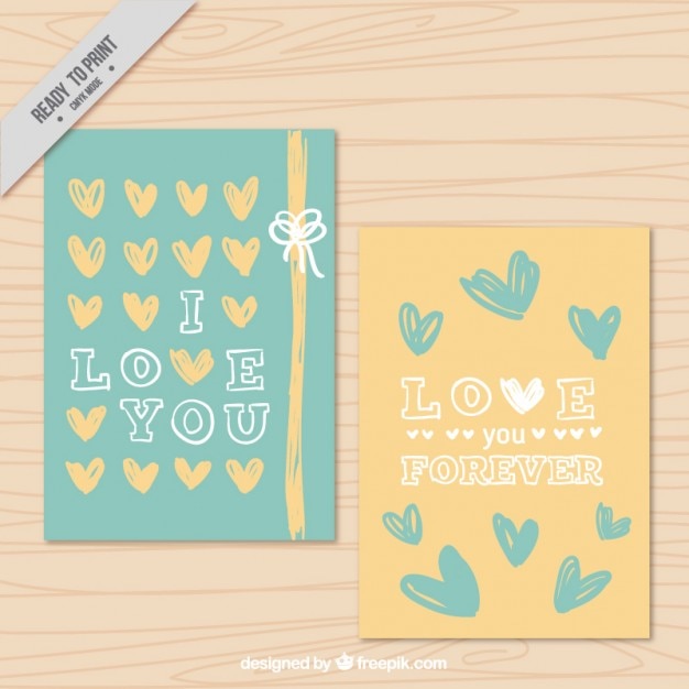 Free vector love cards with hand drawn hearts