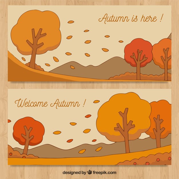 Free Vector lovely autumn banners with hand drawn style