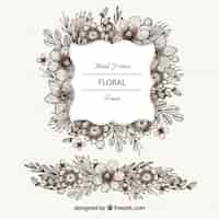 Free vector lovely floral frame with hand drawn style