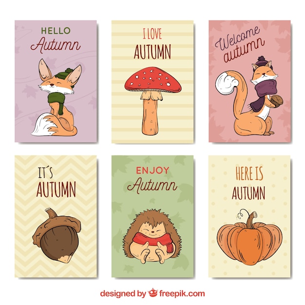 Free vector lovely hand drawn autumn card collection