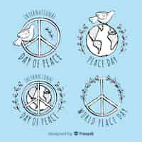 Free vector lovely hand drawn day of peace label collection