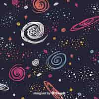 Free vector lovely hand drawn galaxy background