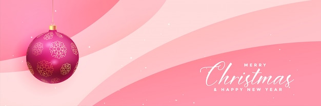Free vector lovely pink christmas banner with realistic ball