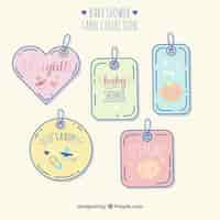 Free vector lovely set of hand drawn baby badges