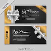 Free vector luxurious golden gift coupons with bow