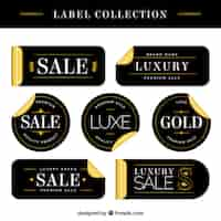 Free vector luxury sale labels with golden details