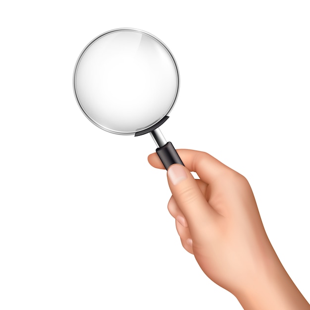 Magnifying glass in human hand