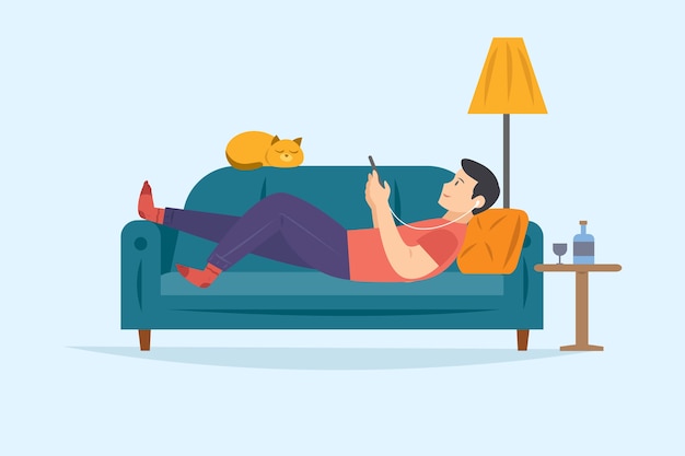 Man on the sofa relaxing while listening to music on smartphone